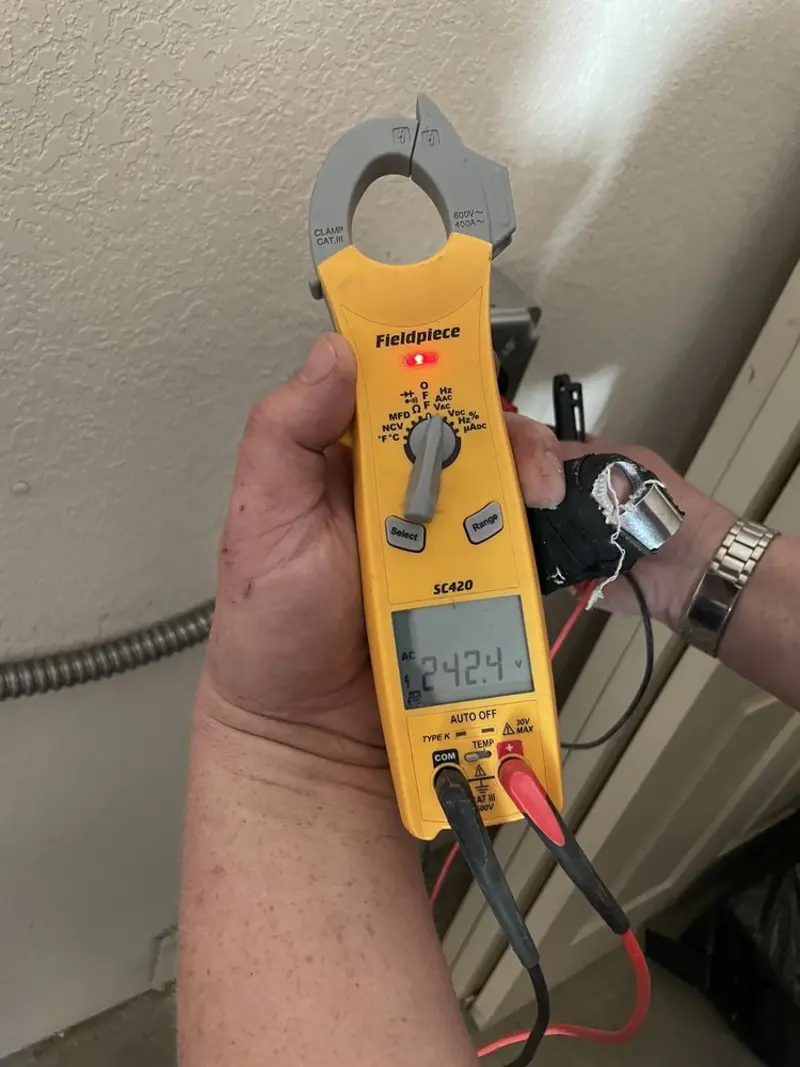 Voltage testing with clamp meter during Hot Tub / Pool Electrical Wiring in Powell